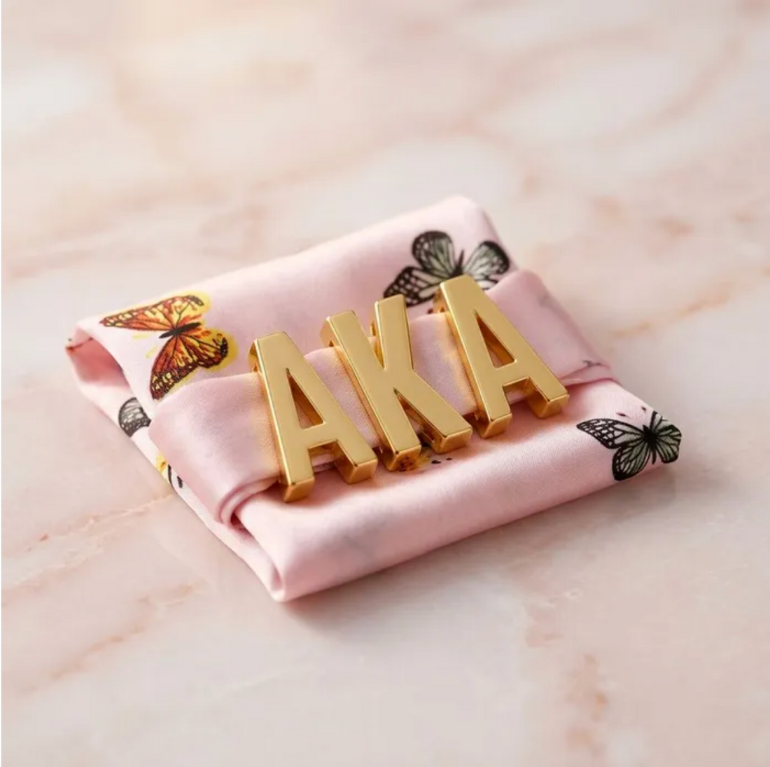 AKA SLIDE LETTER CHARM SET